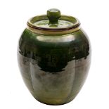 Tilly Young [Contemporary] a terracotta jar and cover: of lobed oviform under green glazes,