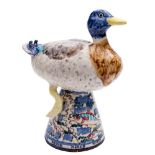 *David Cleverly [Contemporary] two earthenware figures: of a displaying turkey stag on an upturned
