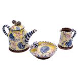 *David Cleverly [Contemporary] a matching earthenware teapot,