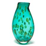 An art glass vase: of flattened oviform with asymmetric neck and wedge shaped profile,