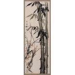 A Chinese painting of bamboo, signed Tao Xiang: depicting bamboo, rockwork and irises,