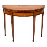 A George III satinwood and inlaid half-round card table:,