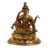 A large Chinese gilt-bronze figure of Guanyin: seated in dhyanasana,
