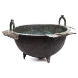 An Islamic white metal inlaid bronze cooking pot.