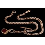 A 9ct gold graduated curb-link watch chain: with attached T-bar and 15ct gold mounted swivel seal,