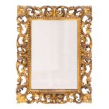 A late 19th Century Florentine carved giltwood rectangular mirror:,