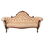 A Victorian carved rosewood settee:,