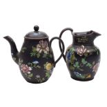 A Wedgwood enamelled black basalt coffee pot and cover and a similar baluster jug: each painted in