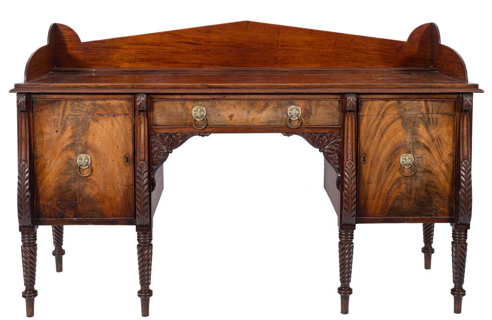 A Regency Scottish carved mahogany sideboard:, with an angled arch three quarter ledge back, - Image 3 of 3