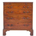 A George III mahogany rectangular chest:, of small size, the top with a moulded edge,