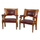 A set of six late Victorian oak open armchairs from a Masonic Hall:,