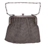 A Continental silver mesh evening purse, bears import marks for London, 1918: 192gms, 6.18ozs.
