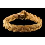 A bracelet of plait design: the clasp stamped '720', approximately 29gms gross weight.