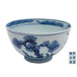 A Chinese blue and white porcelain bowl: the exterior painted with the 'Three Friends of Winter',