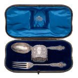 A late Victorian silver three-piece christening set, maker Goldsmiths & Silversmiths Co, London,