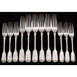 A set of five Edward VII silver Fiddle Pattern table forks, maker Walker & Hall , Sheffield,