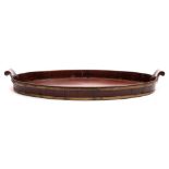 A Georgian mahogany oval tray: of coopered construction,