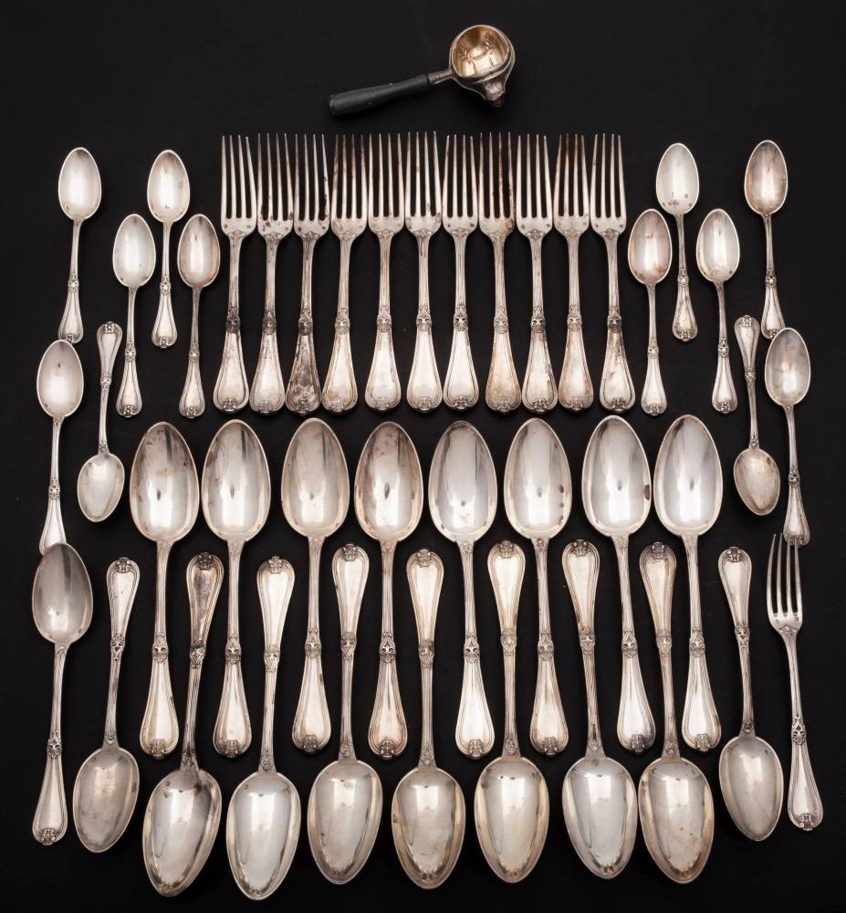 A French silver part flatware service: monogrammed, includes eleven table forks, a dessert fork,