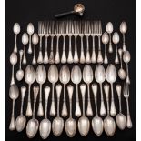 A French silver part flatware service: monogrammed, includes eleven table forks, a dessert fork,