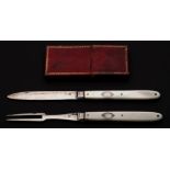 A George III period silver folding fruit knife and matching folding fork,