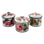 Three Wemyss pottery biscuit boxes: of squat cylindrical form,