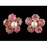 A pair of pink tourmaline and seed pearl-set floral cluster earrings: each with a single,