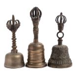 A group of three Tibeton Bajra Ghanti bells: of traditional form, 17-20cm.