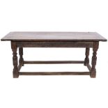 A 17th Century and later oak refectory table:, with an overhanging plank top,