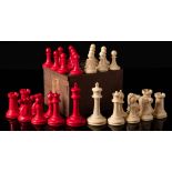 Jaques, London, an ivory Staunton pattern chess set, one side stained red, the other left natural,