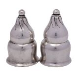 A pair of Georg Jensen silver condiments, stamped marks and bears import marks for Stockwell & Co,