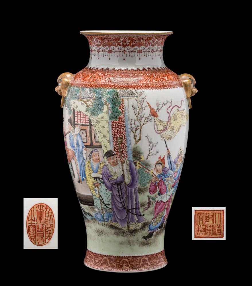 A large Chinese famille rose baluster vase: with gilt lion dog ring handles,