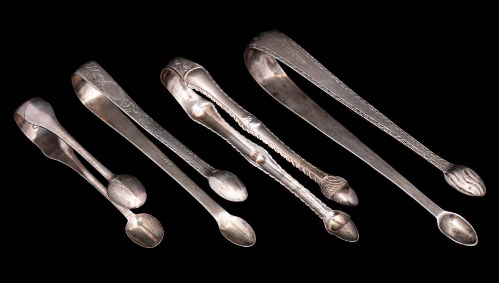 A Georgian Irish silver pair of sugar tongs, maker J.