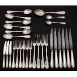 A German silver part flatware service: initialled, includes four table forks, six dessert forks,