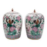 A pair of Chinese famille rose vases and covers for the Peranakan market: of oviform with lotus bud