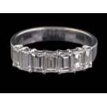 A baguette-cut diamond half hoop ring: with seven slightly graduated baguette-cut stones,