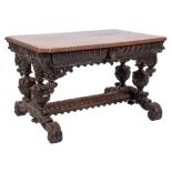 A Victorian Gothic carved oak centre table:,
