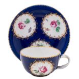 A Doccia tea cup and saucer: with entwined stalk handle,