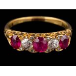 A ruby and diamond five-stone ring: with graduated, oval rubies and round old,