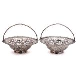 A pair of silver swing-handled sweetmeat baskets,maker W.