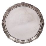 A George V silver salver, maker J Hill & Co, Birmingham, 1931: of plain circular form,