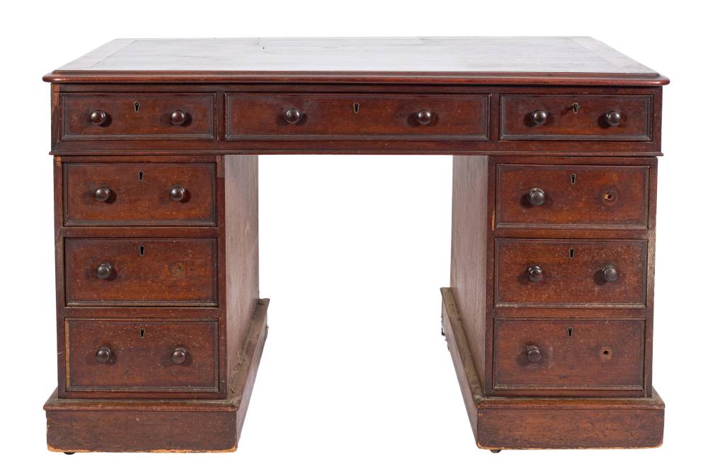 A Victorian mahogany pedestal desk:,