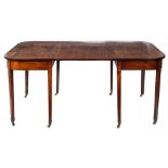 An early 19th Century mahogany and inlaid D-end dining table:,