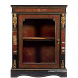 A 19th Century ebonised and gilt metal mounted pier cabinet:,
