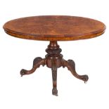 A Victorian walnut oval breakfast table:, of small size,