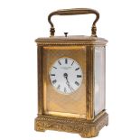 A French engraved carriage clock: the eight-day duration movement having a silvered platform lever