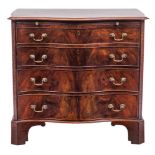 A 19th Century mahogany serpentine fronted chest:,