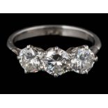 A diamond three-stone ring: with round, brilliant-cut diamonds each approximately 0.40ct, 0.