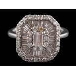 An 18ct white gold and diamond rectangular cluster ring: set with tapered baguette-cut and round,