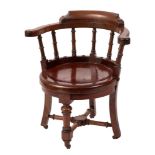 A Victorian mahogany captain's chair:,