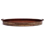 A Georgian mahogany oval tray: of coopered construction,